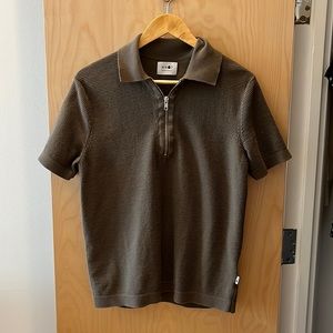 Green polo with zipper detail